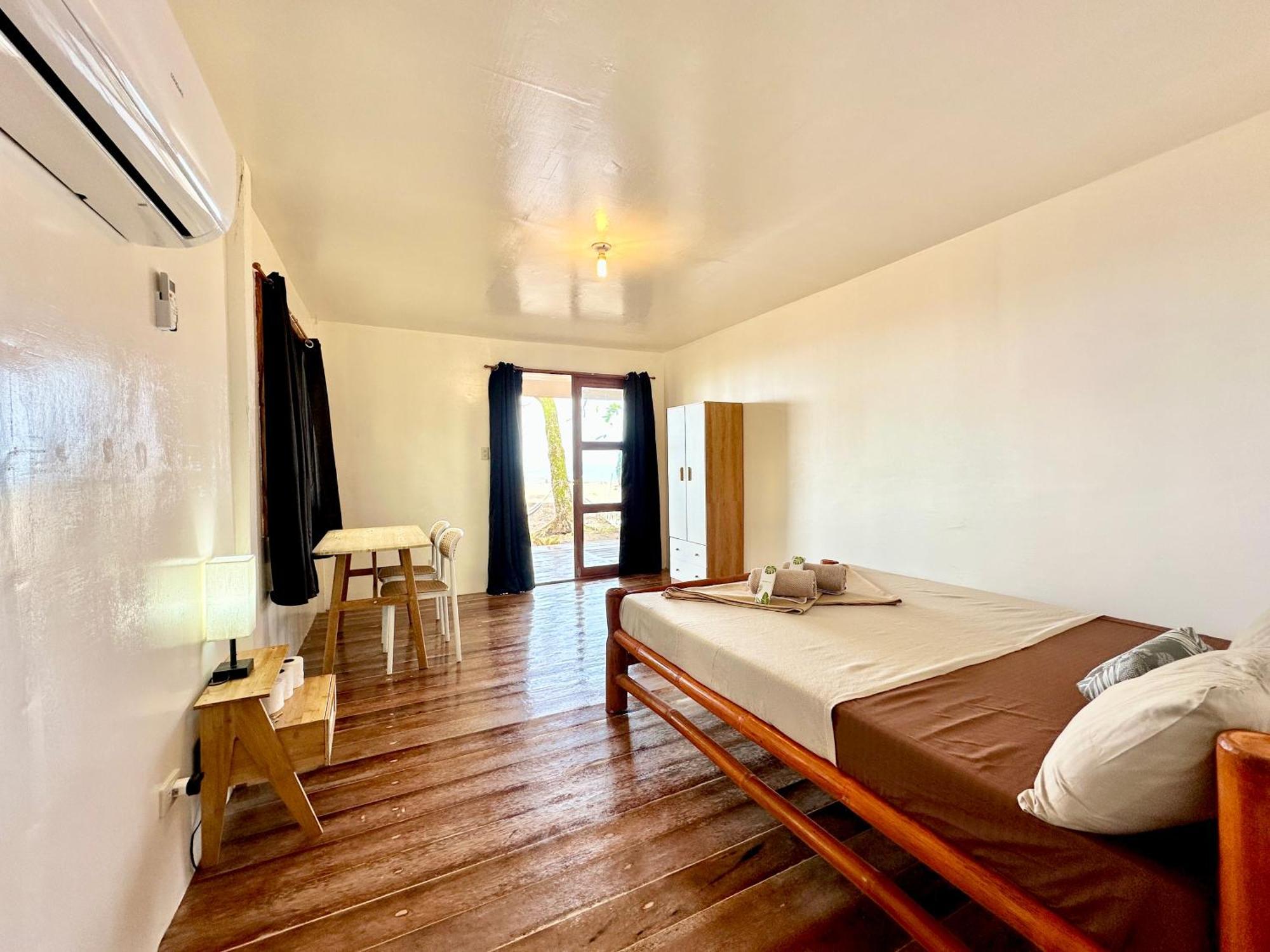 Playa Del Fuego Camiguin Beach Hostel & Resort Мамбахао Экстерьер фото